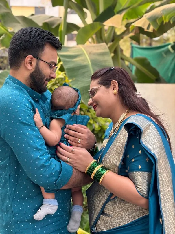 Family in custom teal outfits